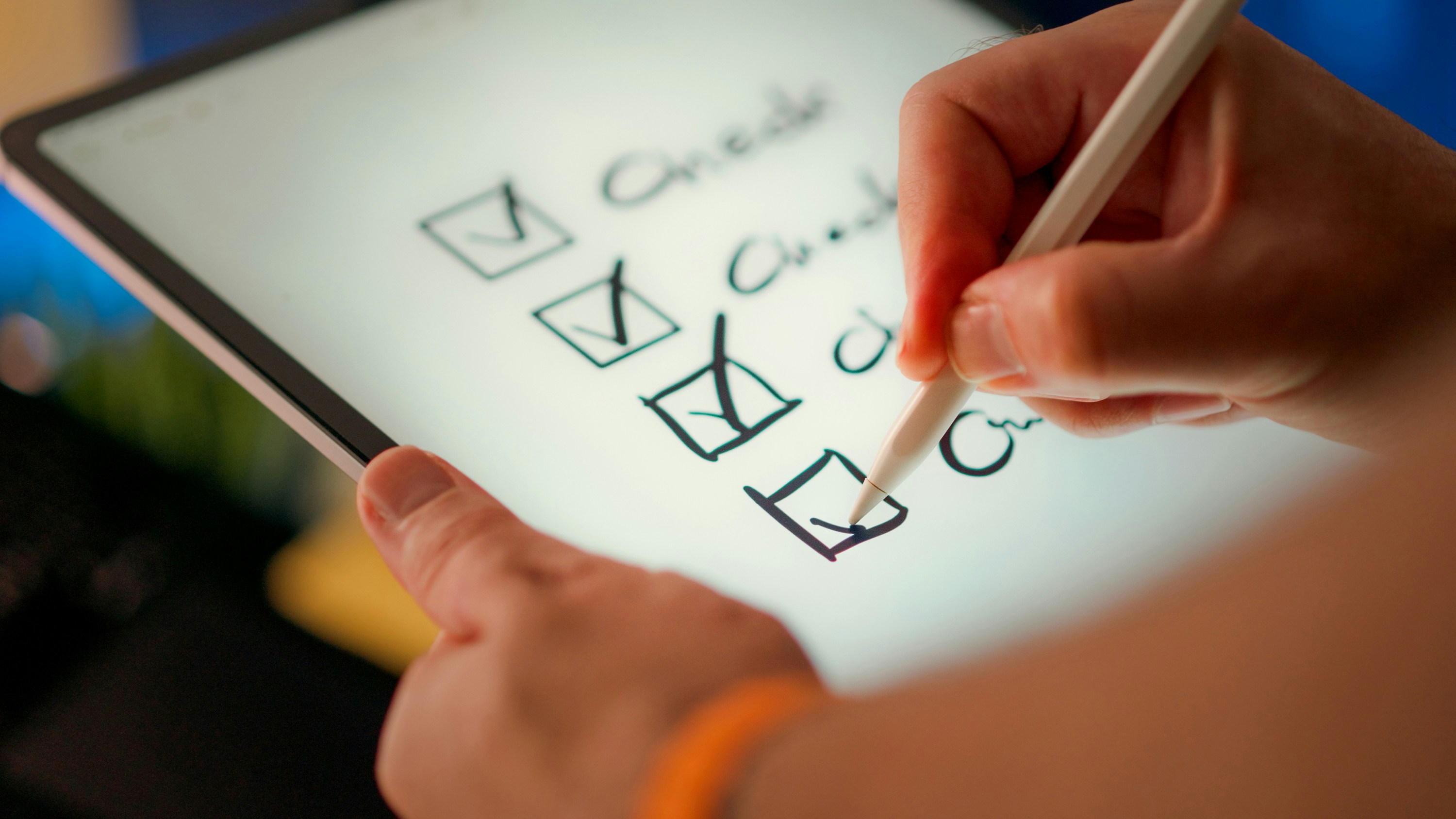 A hand marks off items on a checklist, representing the quiz-style onboarding most styling apps require